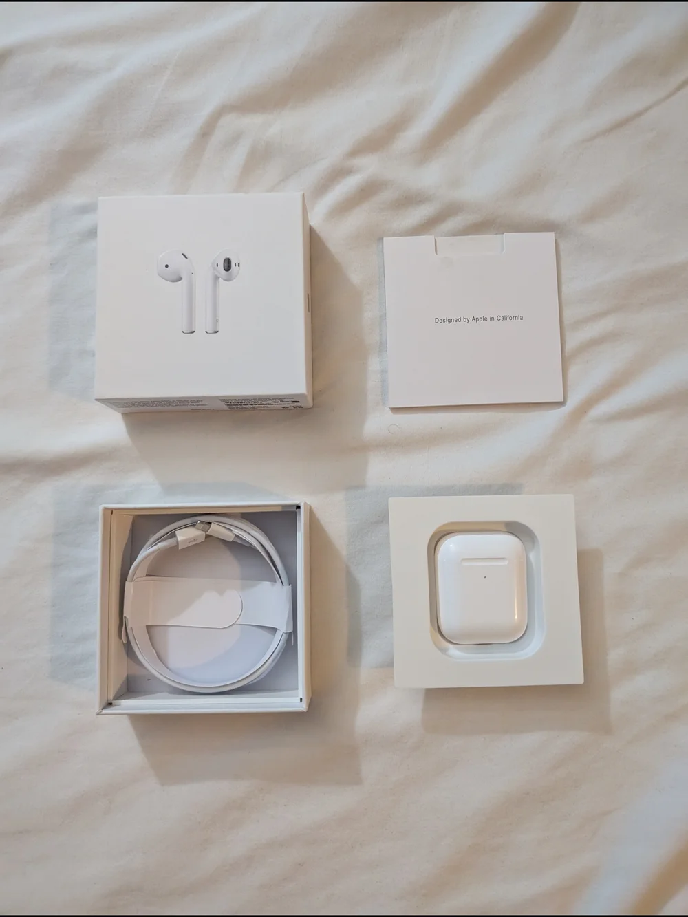 Apple AirPods with Charging Case - White